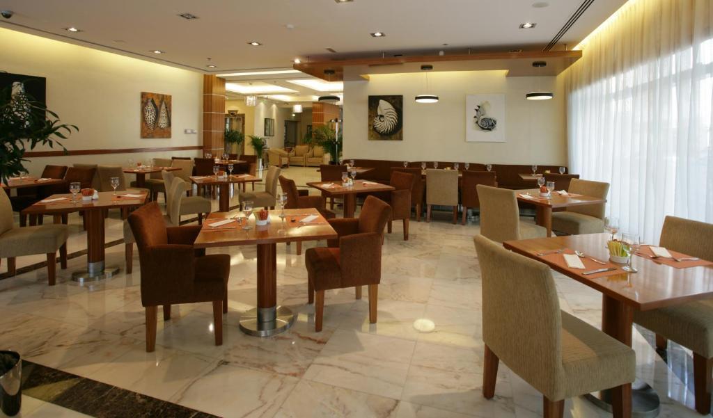 Auris Hotel Apartments Deira Дубай Ресторан фото
